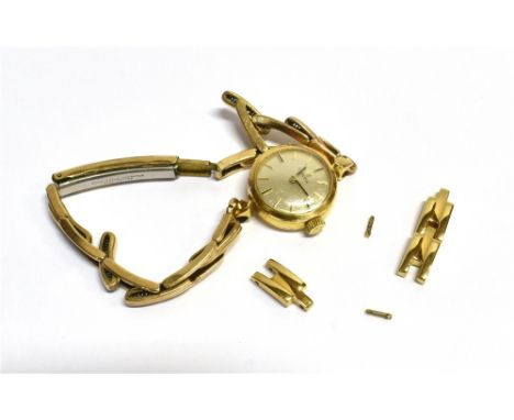 OMEGA LADIES DRESS WATCH 17.6mm diameter round, gold plated case, monogrammed crown, silvered dial, gold baton hands and hour