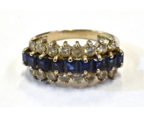 18CT SAPPHIRE &amp; DIAMOND ETERNITY 8.8mm wide three row claw set eternity, with central row of of step cut dark violet blue