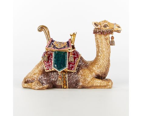 Jay Strongwater, United States. Gilt metal figurine in the form of a seated camel with a saddle for a Nativity set. With poly