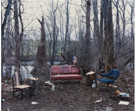 Alec Soth (American, b. 1969). Chromogenic print photograph titled "Luxora, AR (Arkansas)" depicting chairs and a couch in a 