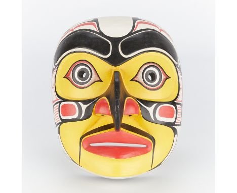 Tsimshian ceremonial hawk spirit mask from the Pacific Northwest. Hand-carved and painted with bright yellow, red, white, and