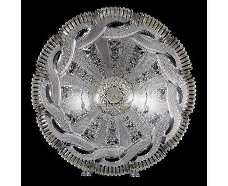 Czechoslovakian hand cut crystal bowl, profusely decorated with geometric designs. In a shallow form with an everted rim, dec
