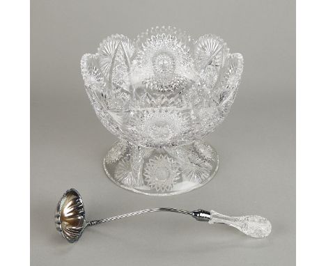 Large American brilliant cut glass punch bowl with a matching, removable pedestal. Also included is a silverplate ladle with 