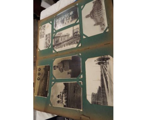An album containing vintage postcards to include French and British Army landing at Vladivostock, scenic, portrait etc
