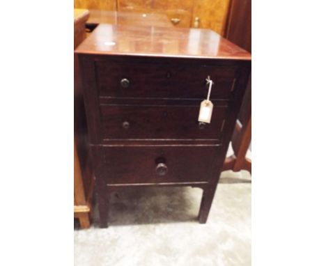 A mahogany commode