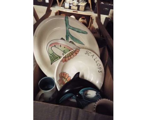 A selection of assorted Poole Pottery to include vases, Dolphin, preserve pots, scallop bowls etc