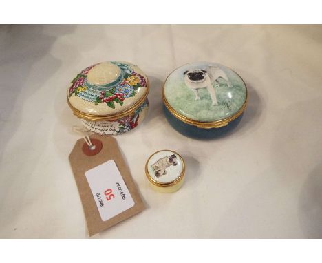 A Halcyon Days enamel Easter box together with two others depicting Pugs  In good condition 
