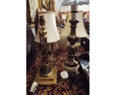 Two onyx and gilt brass table lamps, a brass spiralled table lamp plus one other 