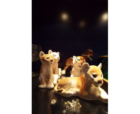 A group of USSR ceramic animals to include a shire horse, lion cubs etc