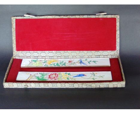 Cased pair of Canton enamel scroll weights, the box 30cm long