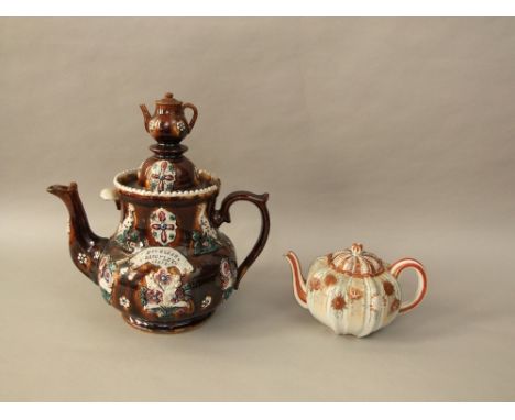 A 19th century bargeware teapot and cover of usual form with impressed inscription Mrs Green, Blockley and dated 1885, 34 cm 