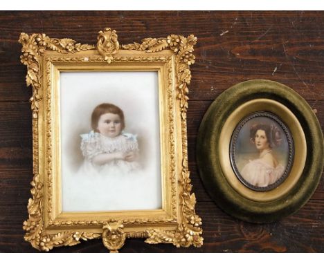 Late 19th century school - Miniature portrait of a young child in lace dress with blue ribbons, tinted photographic print on 