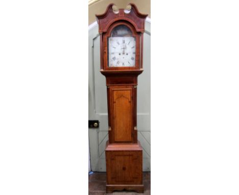 A Regency oak and mahogany cross banded longcase clock, the hood with swan neck cornice, broken arch painted dial with floral