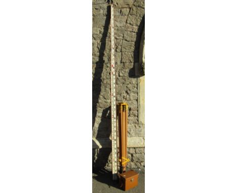 A surveyors telescopic level/marker and folding adjustable tripod stand and surveying level