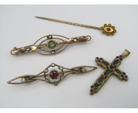 Four gold items comprising a 9ct openwork reversible cross pendant set with rubies and sapphires, a 15ct stick pin and two 9c