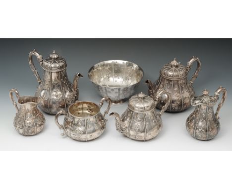 Impressive Victorian seven piece tea service comprising three various tea pots, two milk jugs to include a lidded example, a 