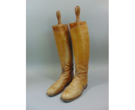 A pair of light tan Horace Batten leather men's hunting boots