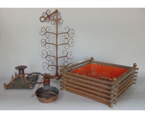 A late 19th century silver plated lozenge shaped planter, an arts and crafts copper candlestick with scrolled handle and a wh