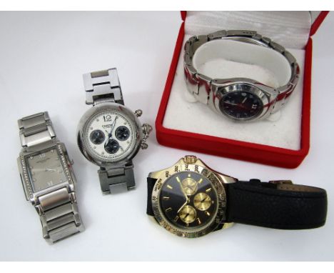 A collection of four vintage wrist watches to include a mid-sized watch "Irony" stainless steel watch and three others