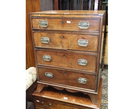 A small Georgian mahogany chest of four long graduated drawers raised on swept supports with brass plate handles, the caddy t