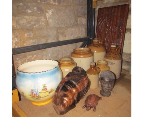 A small collection of vintage stone wear flagons and jars, one with printed merchants mark for Doubell &amp; Co Ltd Cheltenha