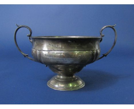 A 1920s silver twin handled trophy, of baluster form, with twin acanthus handles and inscription "Replica of Northwood and Pi