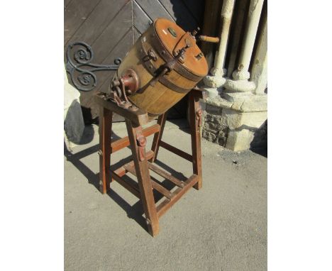 A vintage R Lister &amp; Co coopered oak butter churn and pine stand with iron fittings