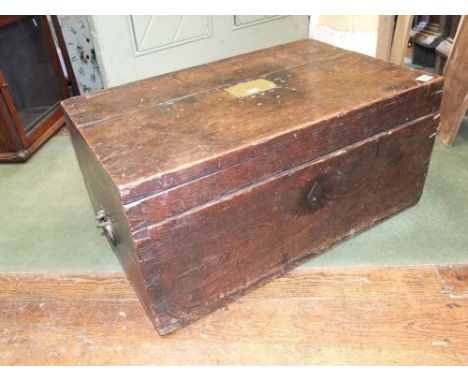 A twin handled oak ships trunk, the brass plaque inscribed Mrs Procheid, part baize lined interior, 68cm wide