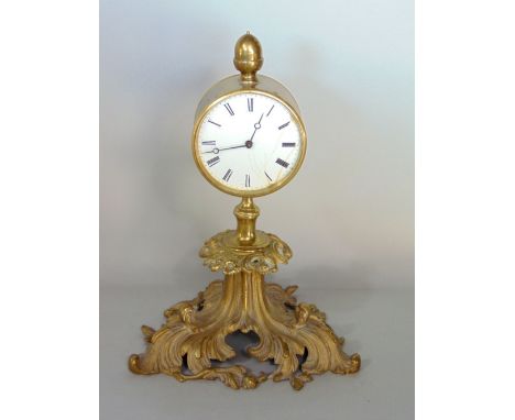 French pillar clock, with typical drum head movement upon a cast rococo type base, 30cm high