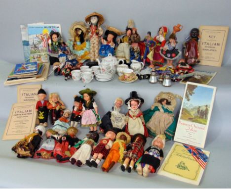 A mixed lot to include various vintage dolls, books on dolls, a child's tea set, a Worcester tea cup and saucer, a pair of mo