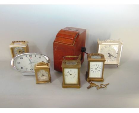 A mixed collection of horology to include various carriage type clocks; together with a further retro mantle clock and a earl