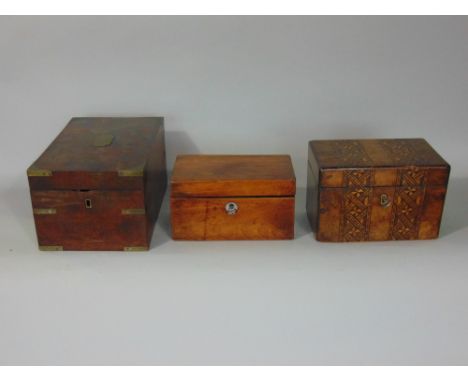 A 19th century mahogany brass banded travelling box, a Victorian walnut and straw marquetry tea caddy and a further walnut te