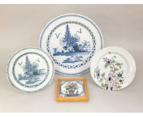 A collection of 19th century continental tin glazed earthenwares including a blue and white charger with chinoiserie decorati