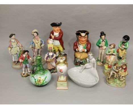 A collection of 19th century and later ceramic figures including a Staffordshire double sided gin and water example, a pair o