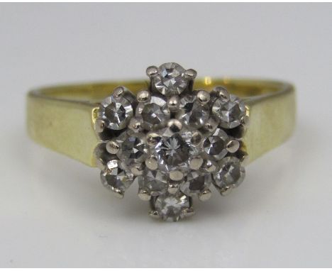 An 18ct diamond cluster ring, size K/L, 4.1g