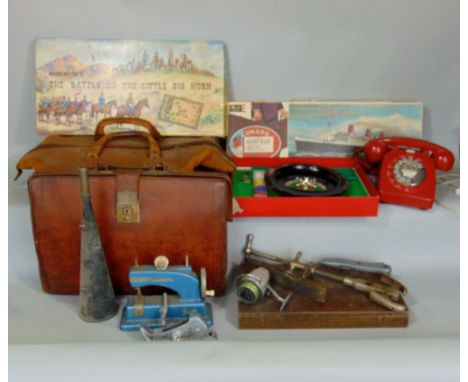 A mixed miscellaneous lot to include a leather gladstone bag and a leather briefcase, a GPO red telephone, various woodworkin