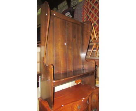 A good quality oak high back winged settle with pegged plank seat and loose button cushion, 107 cm wide x 152 cm high approx