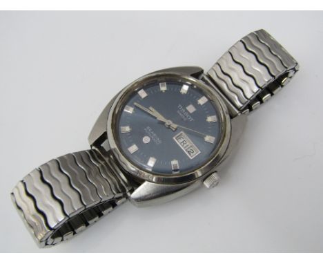 1970s gents Tissot C-Star automatic wrist watch, the blue dial fitted with baton markers, subsidiary day date with concertina