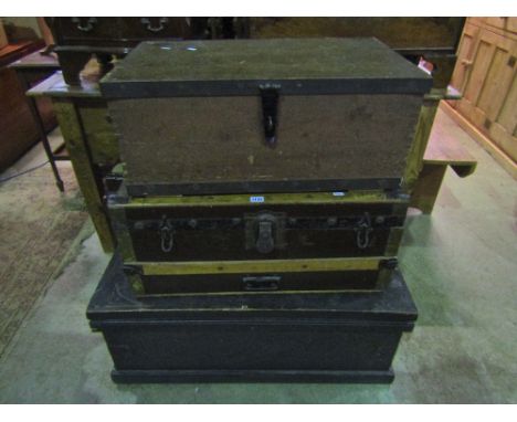 A 19th century stained pine carpenters tool chest with hinged lid and side carrying handles, one other and a timber lathe and