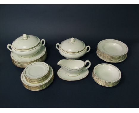 A quantity of Royal Worcester Contessa white and gilt dinnerwares comprising a pair of tureens and covers, sauce boat and sta