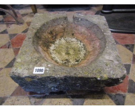 An old weathered stone mortar/small trough of square form with hollowed out bowl and small channel, 35 cm square x 18 cm in h