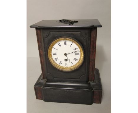 19th century black slate mantle clock fitted with an enamel dial, the single train dial with Roman numerals and darted gilt b