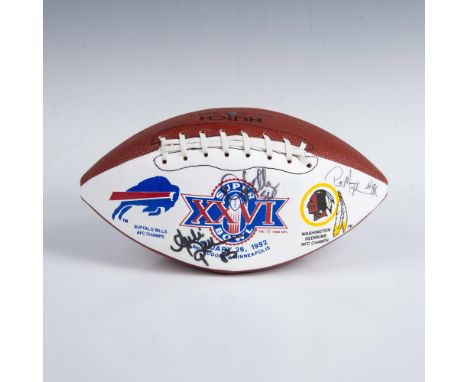 This is a commemorative football signed by Buffalo Bills' players Darryl Talley, Pete Metzelaars, and Howard Ballard. This it