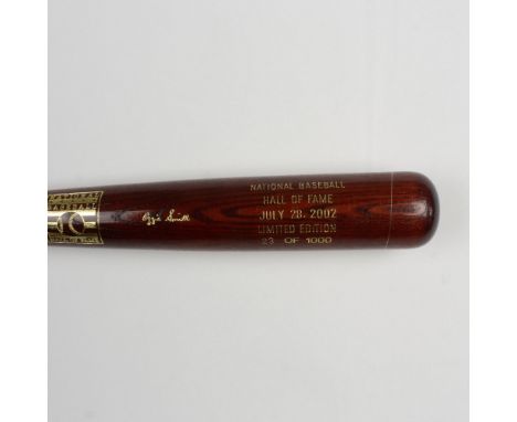 A beautiful, limited edition brown bat with gold etched logos and signature of inductee Ozzie Smith. This item comes in a pla