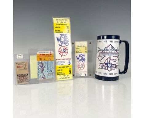 This collection of tickets and one tankard featuring Yankee stadium. The tickets include the 1956 World Series Yankee Stadium
