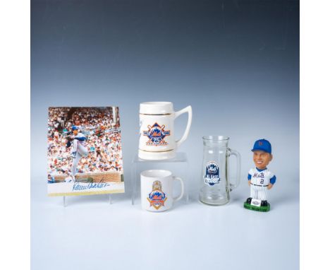 A set of 5 New York Mets items, including a mug celebrating the Mets 1986 World Championship, a glass beer stein for the 1988