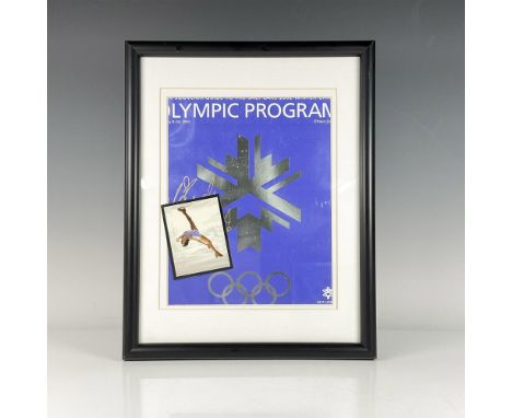 Framed 2002 Olympic program signed on the cover in gold by Gold-medal winner Sarah Hughes. Certificate of Authenticity from G