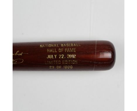 A beautiful, limited edition brown bat with gold etched logos and signatures of inductees, Ron Santo and Barry Larkin. This i
