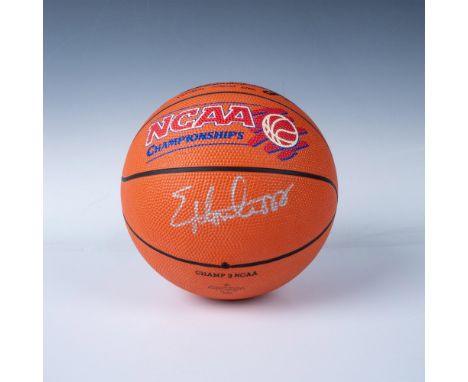 This small basketball features a NCAA championship logo and signed in silver by Eric Montross. Certificate of Authenticity T.