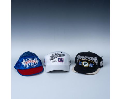 A set of three NFL caps, one white celebrating the New York Giants 2005 NFC East win, one black and white for the Green Bay P